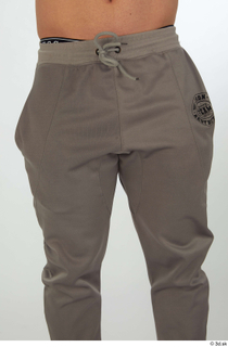 Joel dressed grey jogger pants sports thigh 0001.jpg